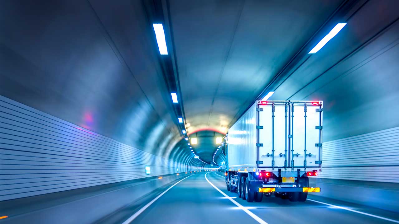 A truck driving through a tunnel