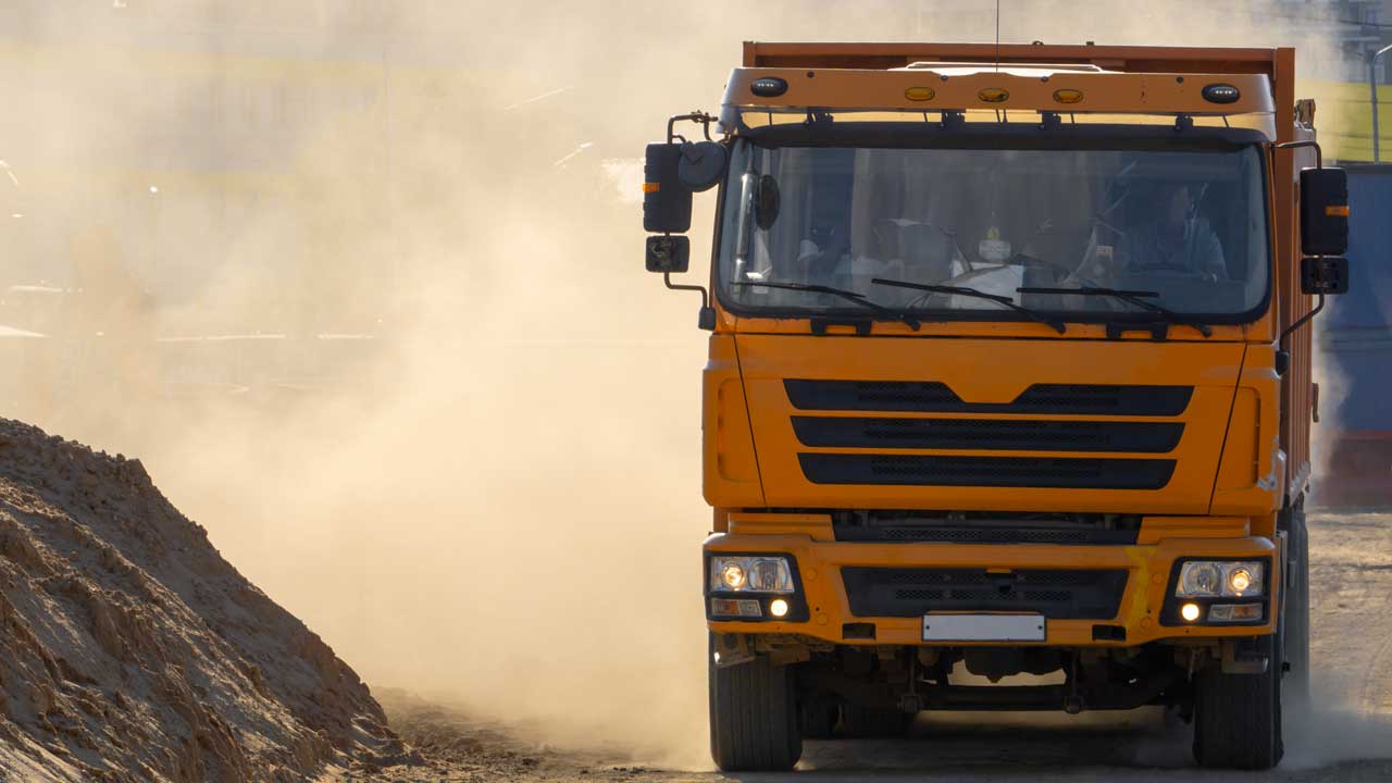 A large truck on a dirt road
