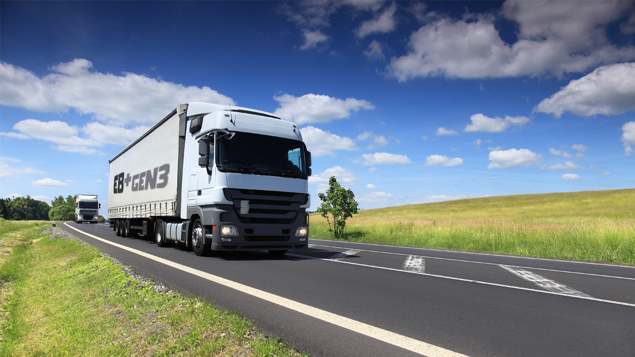 Trailer with EB+Gen3 logotype driving on the road