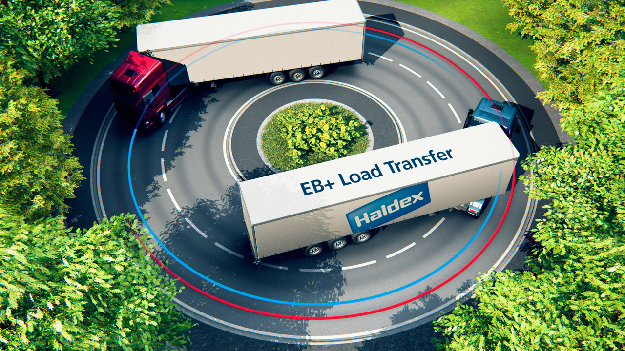 Two trailers navigating a roundabout